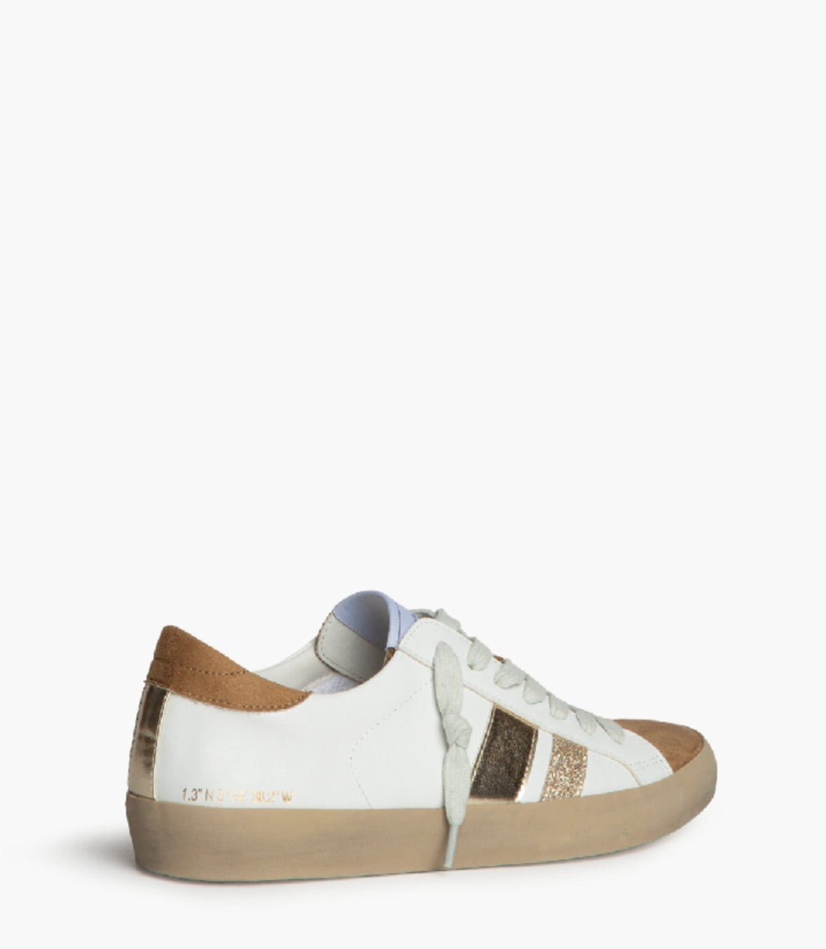 Sapatilhas brancas com riscas douradas e purpurinas com biqueira camel