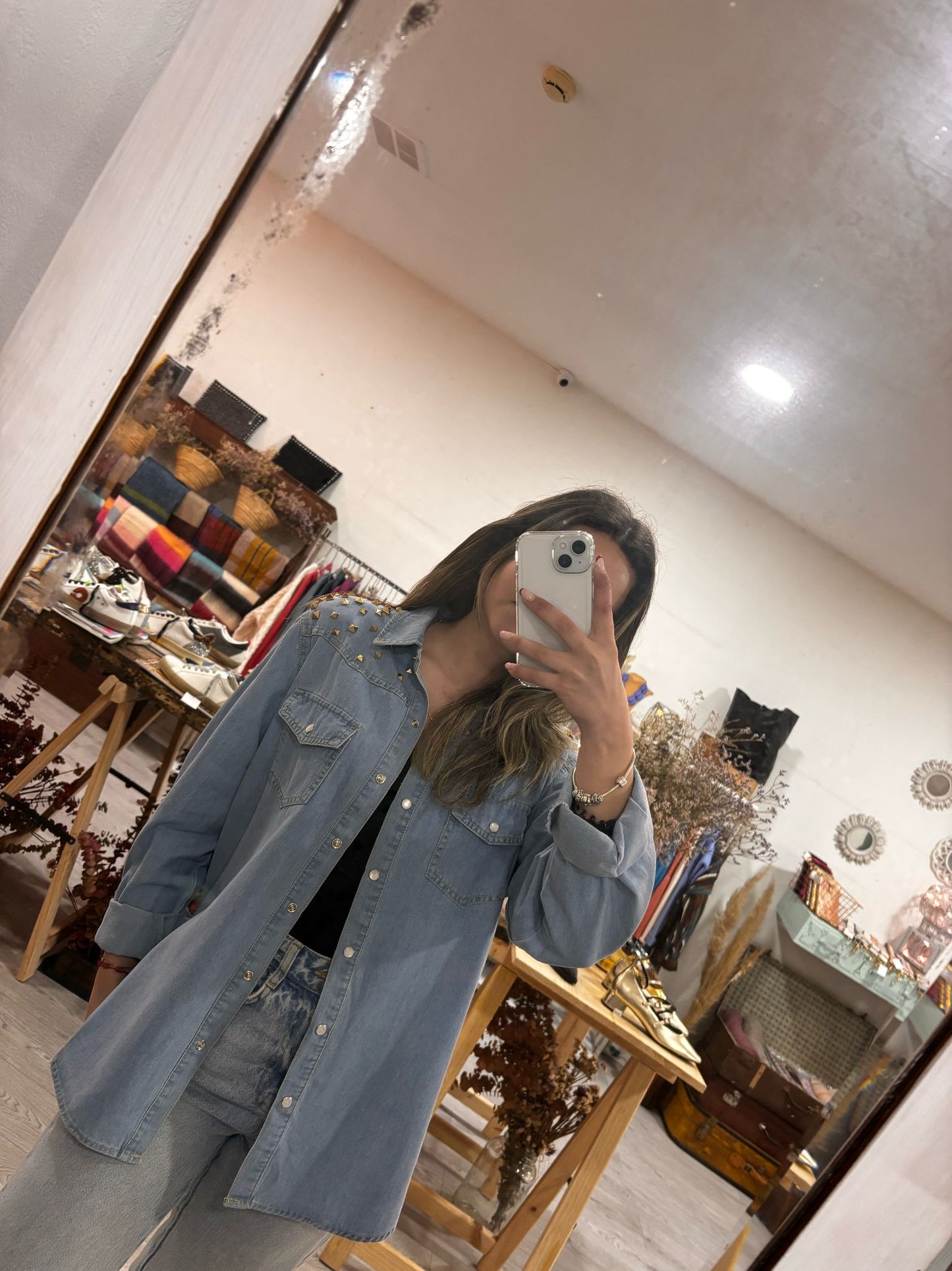 Denim shirt with shoulder appliqués