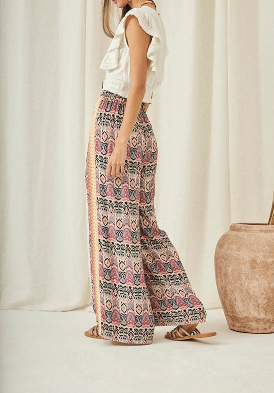 Calças estampado étnico e crochê CS.Nef