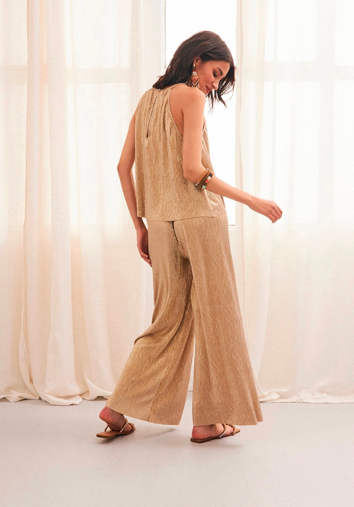 SE.Oro gold pleated pants