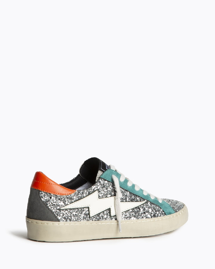 Sapatilhas glitter prata raio branco com detalhes laranja e esmeralda