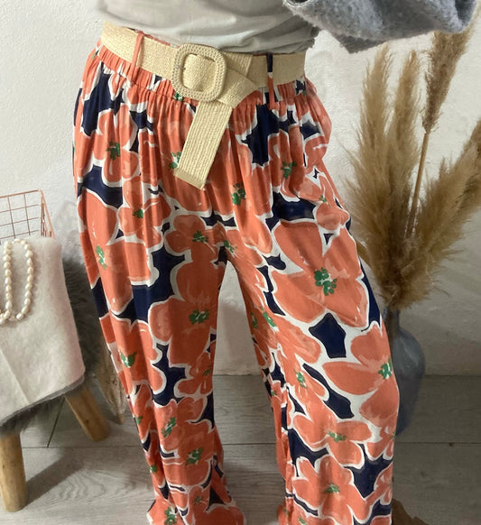 Pantalonas estampado de flores laranja e azul com cinto