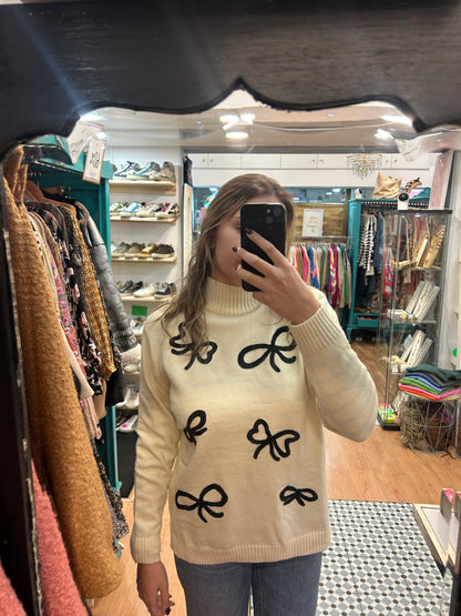 Camisola malha preta laços