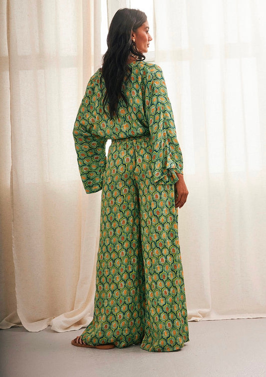 Pantalones de satén estampado verde AU.Sawa